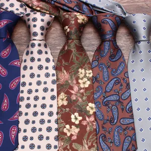 Men's stylish patterned neckties set featuring classic paisley and floral designs for suits.