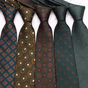 Men's green business necktie set featuring vintage geometric and animal patterns, detail view.