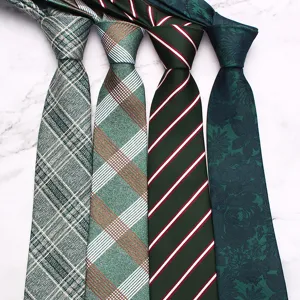 Green series business neckties featuring vintage stripe and floral jacquard patterns in detail view.