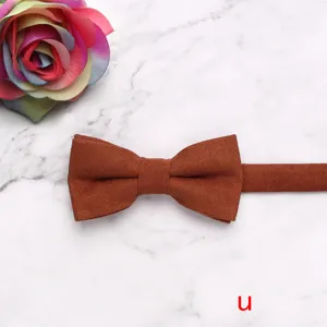Brown corduroy children bow tie for boys and girls, stylish plain neckwear accessory.