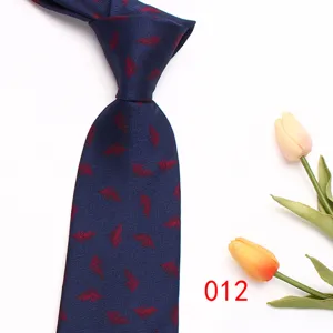 Classic navy blue business men necktie featuring elegant red leaf patterns for formal wear.
