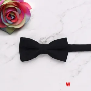 Kids solid color black velvet bow tie detail, stylish fashion accessory for boys and girls.