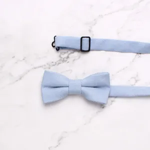 Light blue kids bow tie detail, adjustable strap, fine textured fabric accessory for kids.