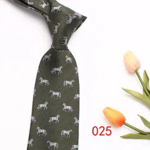 Dark green horse pattern necktie detail shot featuring elegant equine print and tulip prop.