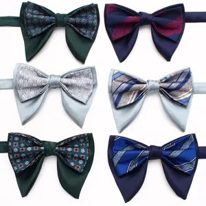 Detailed view of men's double layer bow tie with classic retro patterns, elegant silk fabric.