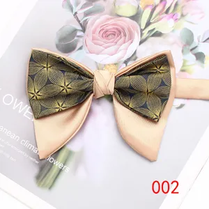 Detail view of a luxury champagne and blue floral pattern double layer men bow tie prop.