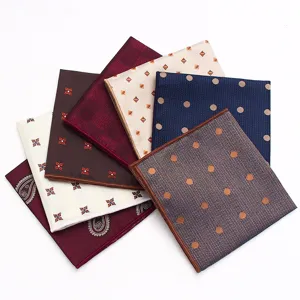 Detailed shot of men's business pocket squares showcasing assorted classic patterns and rich colors.