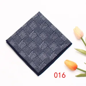 Detailed view of a stylish dark blue checkered pocket square for men suits and formal wear.