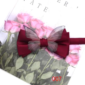 Solid color burgundy bow tie with elegant butterfly decoration for men and women banquet suit.