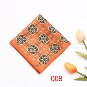 Pochette de costume florale orange pour homme mariage et fête d'affaires formelle.