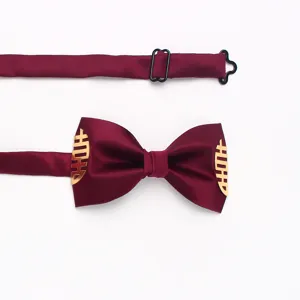 Burgundy wedding bow tie for men with gold double happiness character and adjustable strap.