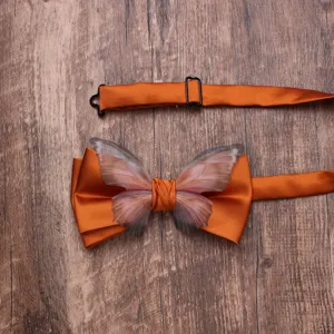 Orange butterfly bow tie with sheer wing detail close-up view for formal party accessories.