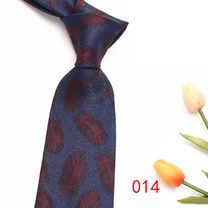 Men's jacquard patterned necktie detailed view showing fine blue fabric texture and red feather print.