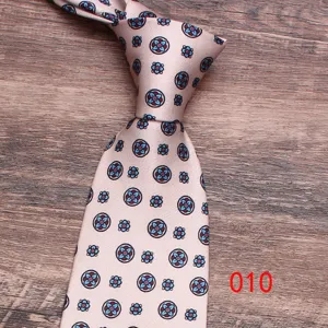 Pink floral men's necktie with blue medallion pattern, classic design for business & casual wear.