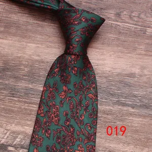 Green red floral patterned necktie detail, elegant men's business casual silk tie.