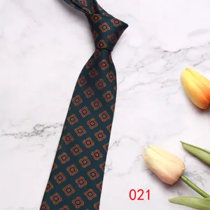 Green vintage geometric pattern business men necktie detail close-up fashion accessory