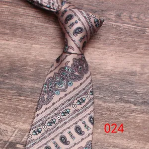 Classic men paisley tie detail view, elegant floral pattern necktie for business and party wear.