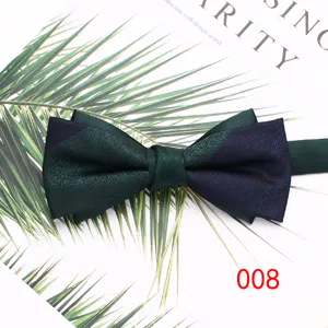 Men's double-layered bow tie, stylish green and blue contrast design for weddings and formal events.