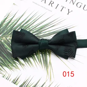 Dark green double layer men's bow tie with elegant leaf pattern for wedding and formal wear.