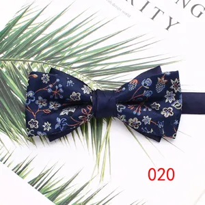 Detailed view of the navy blue double layer floral woven men bow tie with exquisite design.