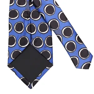 Men's printed necktie in blue with classic circle pattern featuring detailed back construction.