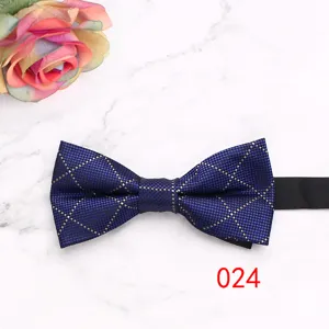 Detailed view of a stylish blue geometric patterned men's bow tie for formal business wear.