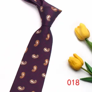 Close-up detail of dark purple paisley patterned tie with yellow tulip prop decoration.