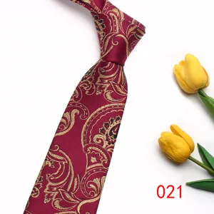Burgundy silk-like necktie with elegant gold paisley pattern detail for men and women.