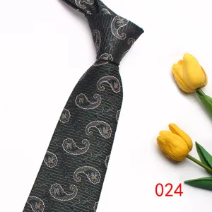 Detailed view of dark green striped paisley men tie featuring elegant pattern on premium fabric.