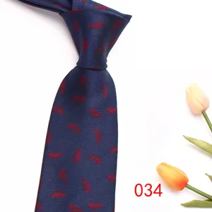 Blue men's business formal tie with elegant red feather jacquard pattern detailed view.