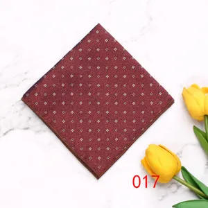 Detailed view of a red geometric pattern polyester pocket square for men suit styling.