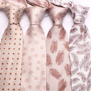 Set of four elegant men light-colored ties featuring geometric and feather patterns for business.