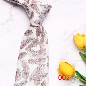 Classic men's silk tie with elegant feather print pattern, ideal for business and casual wear.
