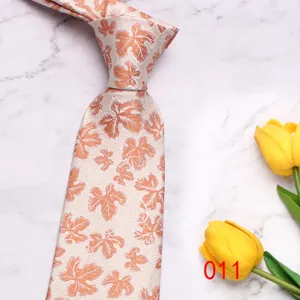 Men's light color floral necktie, stylish leaf pattern print for business casual wear.