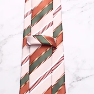 Close-up detail of men's classic striped tie with pink, green and orange diagonal stripes.