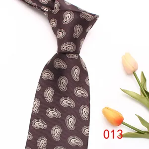 Brown paisley silk necktie for men, elegant business casual wedding tie, stylish design.