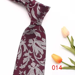 Classic men's paisley necktie in burgundy with silver floral pattern, ideal for business wear and weddings.
