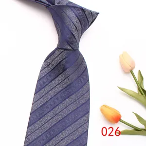 Close-up detail of the classic men's blue striped tie featuring delicate textured fabric.