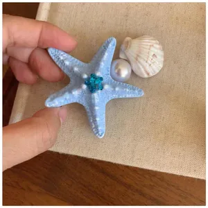 Blue rhinestone starfish hair clip with pearl and shell, chic beach vacation duckbill hairpin.