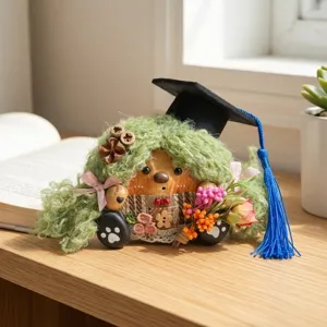 Handmade graduation doll ornament detail, creative entada bean pod craft with cap.