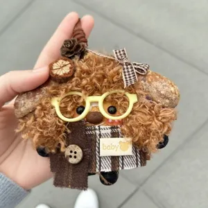 Handmade fluffy bear plush pendant with cute glasses and plaid scarf for bag decoration.