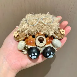 Handmade cute bear bag pendant detail view, creative walnut pod craft charm for daily decoration.