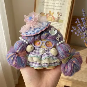 Handmade bean pod doll pendant detail, creative plush wool hair cute bag charm accessory.