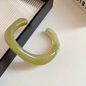 Green acrylic irregular open bangle bracelet, minimalist chic fashion jewelry for women daily wear.