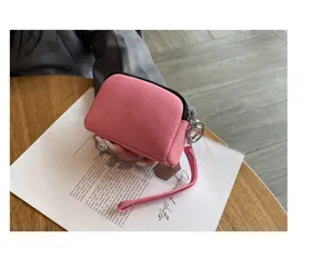 Mini pink genuine leather coin purse women small double zipper clutch wrist bag detail