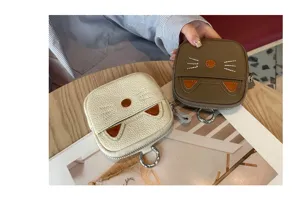 Cute genuine leather mini cat coin purse with zipper, keychain and adorable animal ears design.