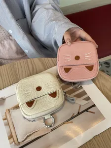 Cute leather cat coin purse mini zipper wallet with keychain for women daily use and storage.