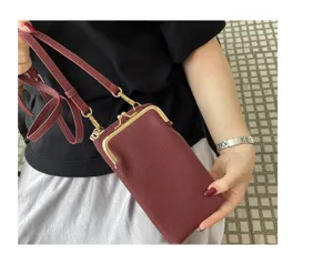 Detailed close-up shot of the genuine leather mini crossbody phone bag in maroon color.