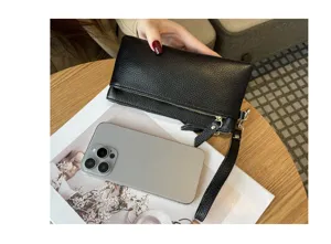 Black genuine leather long clutch bag for women with wrist strap, large capacity wallet and phone pouch.
