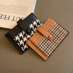 Mini houndstooth card holder for women, stylish slim pocket wallet with secure snap closure.